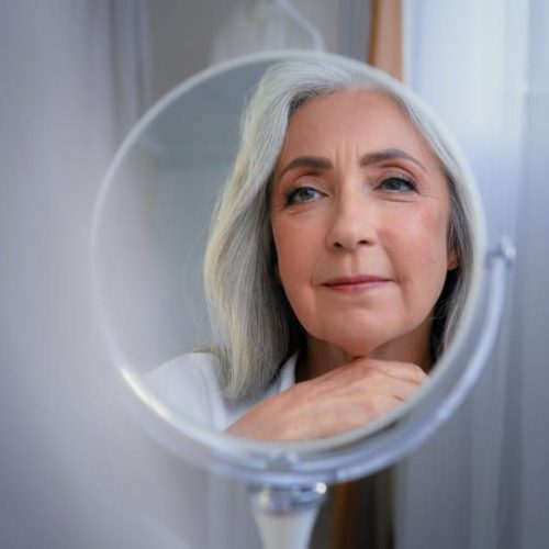 mirror-reflection-female-wrinkled-face-50s-middle-2022-12-05-23-08-10-utc mirror-reflection-female-wrinkled-face-50s-middle-2022-12-05-23-08-10-utc